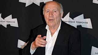 French actor Michel Piccoli gestures as he poses for photographers, during a retrospective of his career, in Paris, Wednesday, Sept. 4, 2013. (AP Photo/Thibault Camus)