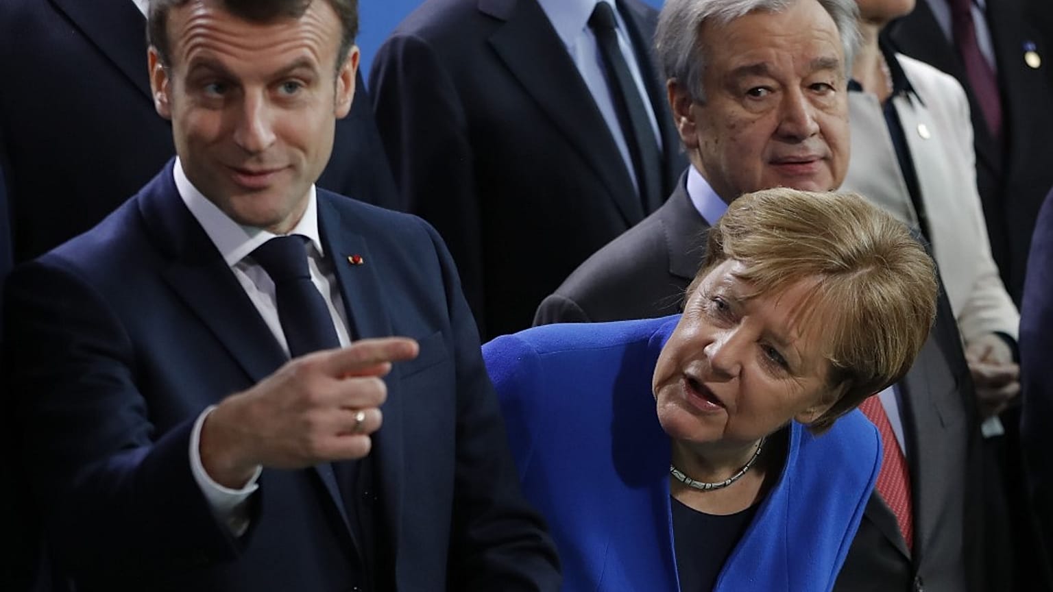 (L-R) French President Emmanuel Macron, German Chancellor Angela Merkel (Photo by Odd ANDERSEN / AFP)