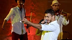 Morocco singer Saad Lamjarred performs at Carthage Festival on July 30, 2016 at the romain theatre of carthage near Tunis. (Photo by FETHI BELAID / AFP)