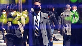 People on a street in Tokyo. March 18, 2020