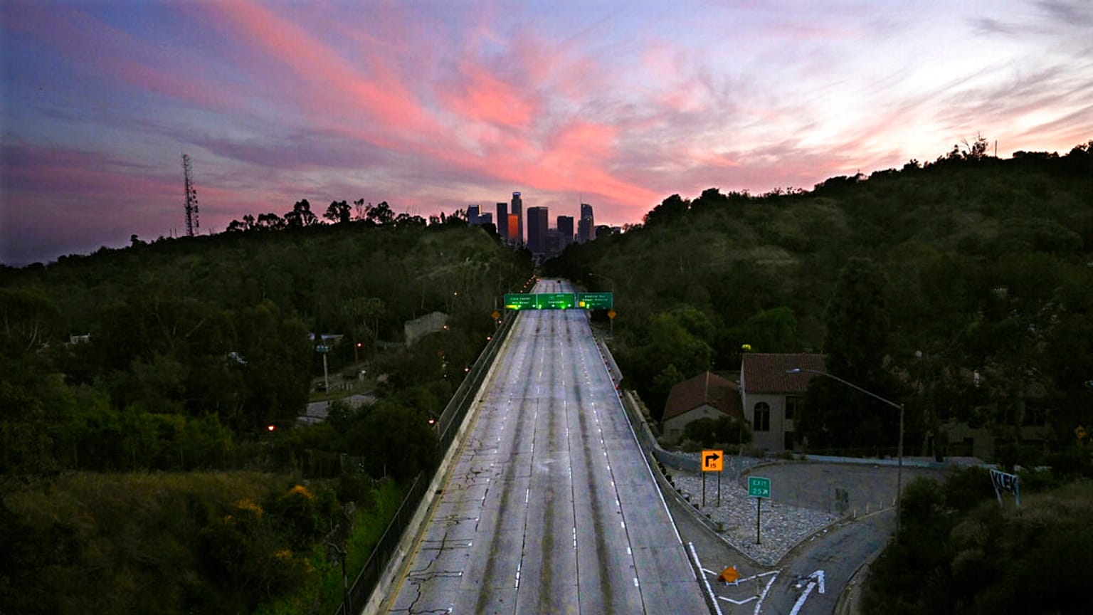 File: Empty lanes of the 110 Arroyo Seco Parkway that leads to downtown Los Angeles during the coronavirus outbreak in Los Angeles, California, April 26, 2020