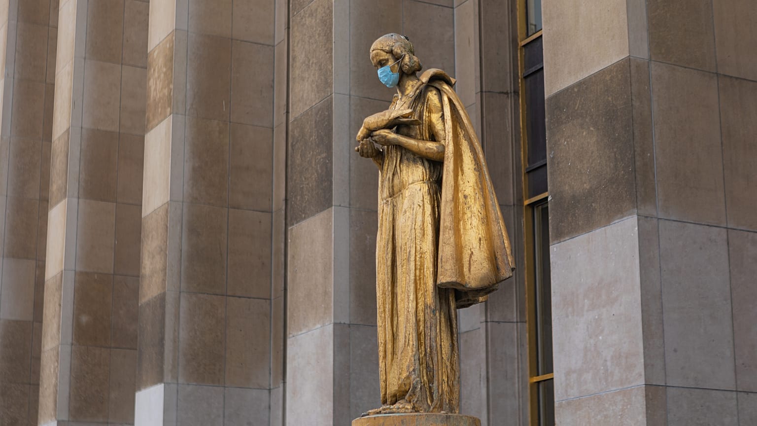 One of the sculptures at Trocadero square in Paris France is decorated with as a mask