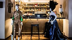 Mannequins showcase designers’ collections at restaurant “Cosy” in Vilnius Old Town.