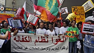 Abolish the Kafala system. Stop trying to deporting illegal domestic workers," during a rally to mark International Domestic Workers Day, in Beirut, Lebanon, Sunday, June 