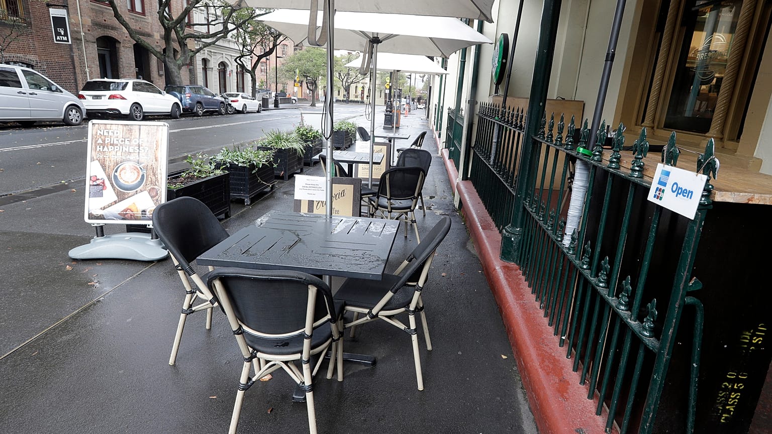 Tables go empty at a restaurant in Sydney, May 2020.
