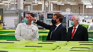 Emmanuel Macron visits a factory of manufacturer Valeo in Etaples
