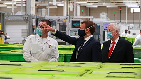 Emmanuel Macron visits a factory of manufacturer Valeo in Etaples