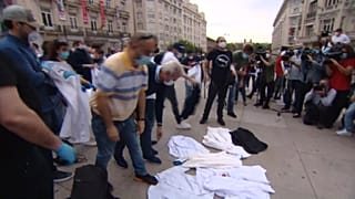 Chefs throwing their aprons to the ground