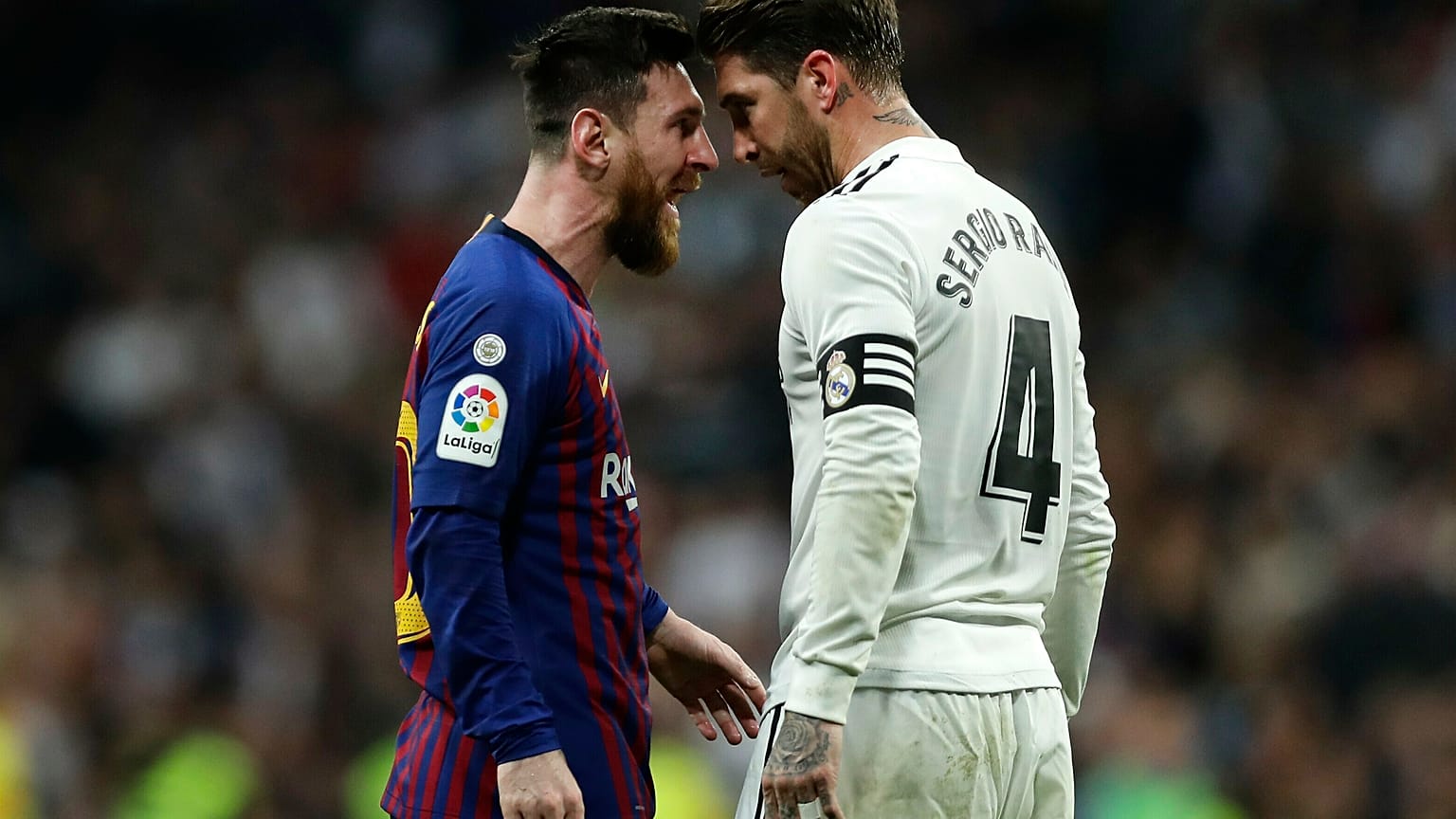 مهاجم نادي برشلونة ليونيل ميسي ومدافع ريال مدريد سيرجيو راموس