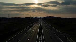 An empty highway is pictured outside Lyon, central France, Sunday, March 22, 2020. (AP Photo/Laurent Cipriani)