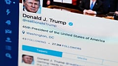 This April 3, 2017, file photo shows U.S. President Donald Trump's Twitter feed on a computer screen in Washington. President Donald Trump is claiming that Twitter has removed