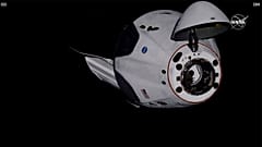 SpaceX Dragon crew capsule, with NASA astronauts, docks with the International Space Station