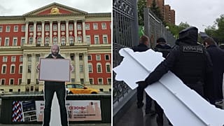 Картонные изображения журналиста "Новой газеты" Ильи Азара в центре Москвы