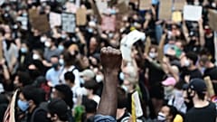 Protesters demonstrate on June 2, 2020, during a "Black Lives Matter" protest in New York City. Anti-racism protests have put several US cities under curfew to suppress riots