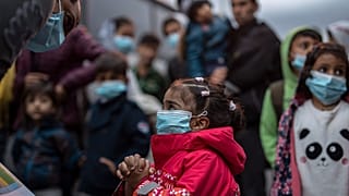 Virus Outbreak Greece Migrants