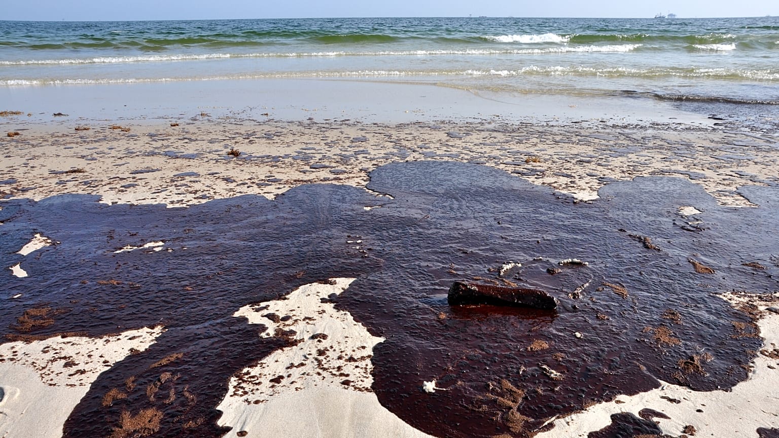 Oil spill on a beach