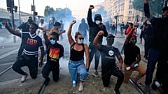 Protesters react during a demonstration Tuesday, June 2, 2020 in Paris.
