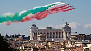 The Frecce Tricolori aerobatic squad of the Italian Air Force fly over Rome