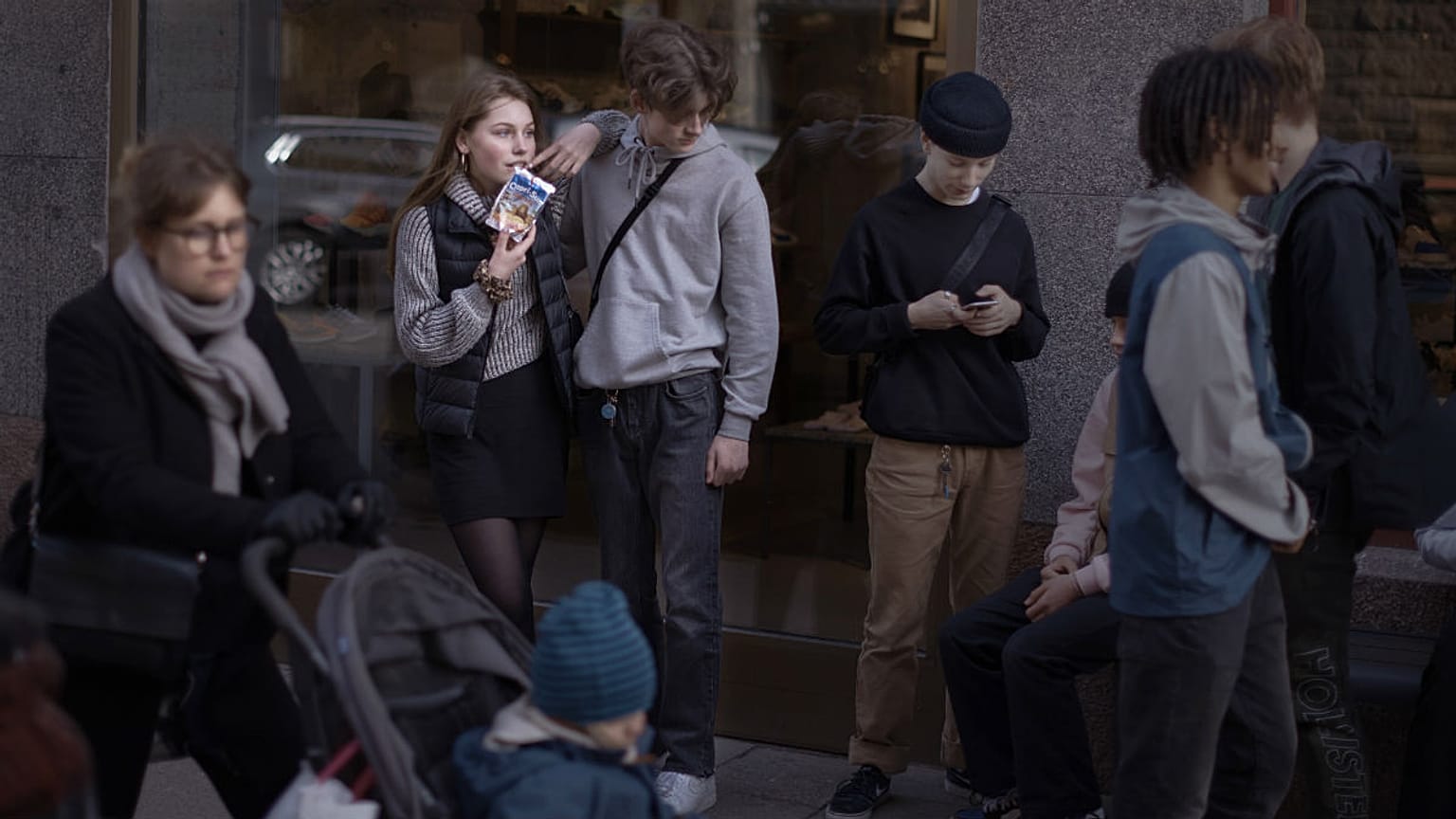 People hang out in the street in Stockholm, Sweden