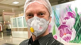 This March 19, 2020, file photo provided courtesy of the White family, shows U.S. Navy veteran Michael White in Mashhad, Iran.