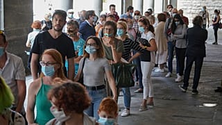 Visitors arrive on the reopening day of the Uffizi museum, in Florence