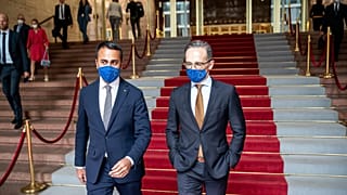 German Foreign Minister Heiko Maas, right, and his Italian counterpart Luigi Di Maio wear face masks