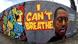 A graffiti by artist 'EME Freethinker' that expresses support of U.S. protests over the death of George Floyd in the public park 'Mauerpark' in Berlin, Germany