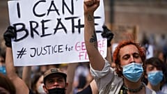 June 7, 2020. People gather in Rome calling for justice for George Floyd, who died in May after being restrained by police in the US.