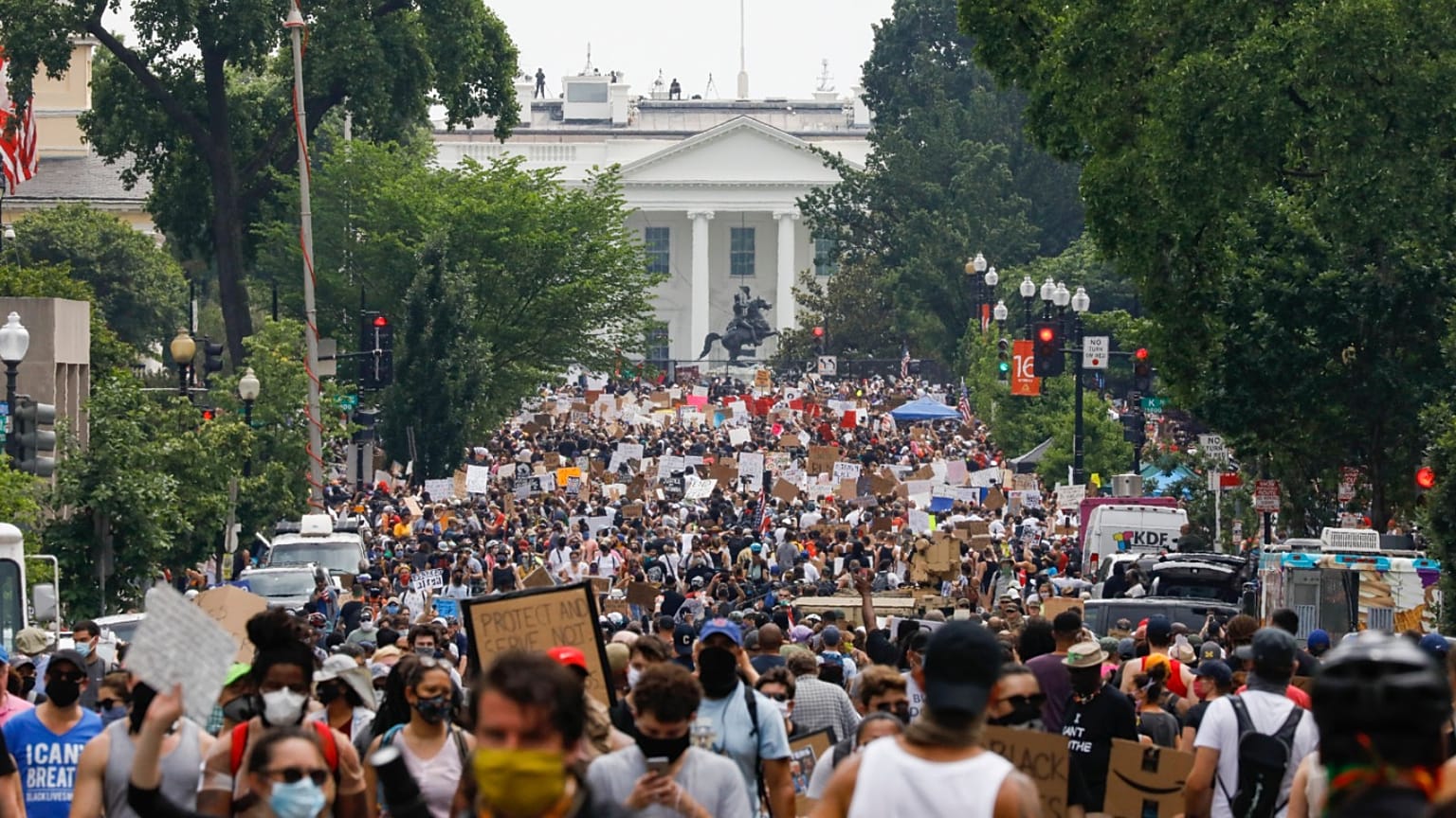Demonstrators protest Saturday, June 6, 2020, near the White House in Washington, over the death of George Floyd