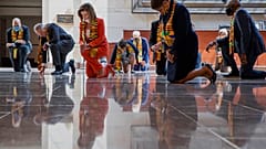 House Speaker Nancy Pelosi kneels with other US Democrats to pay tribute to George Floyd