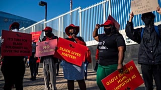 Economic Freedom Fighters protest outside the US consulate in Johannesburg in South Africa in support of Black Lives Matter