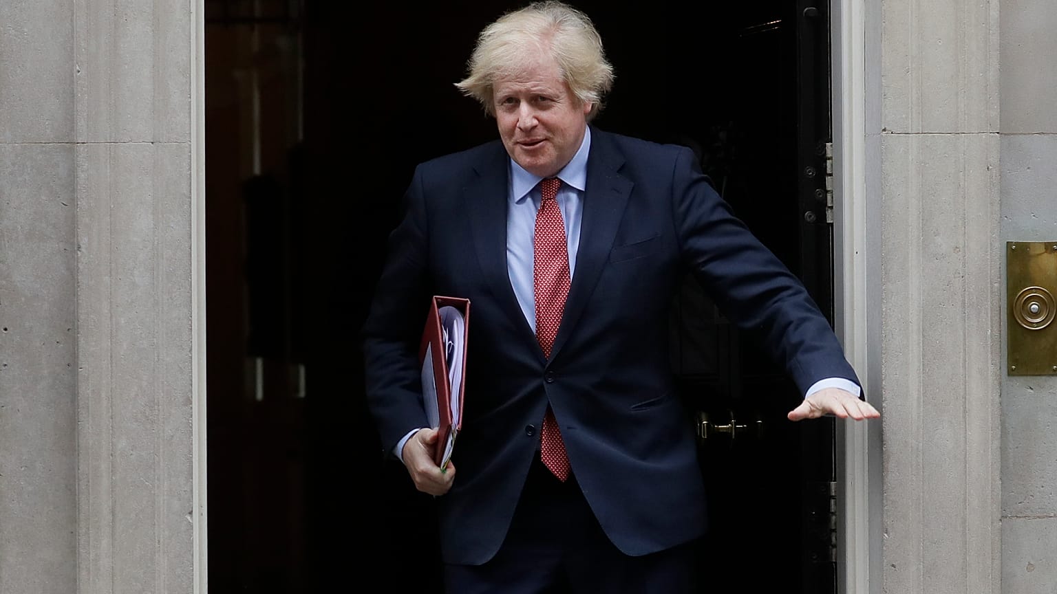 Britain's Prime Minister Boris Johnson leaves 10 Downing Street to attend the weekly session of PMQs in Parliament in London, Wednesday, June 10, 2020.