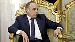 Syrian Prime Minister Imad Khamis listens to Secretary of Iran's Supreme National Security Council Ali Shamkhani in a meeting in Tehran, Iran.