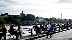 Paris is rediscovering itself, as its cafes and restaurants reopen for the first time since the fast-spreading virus forced them to close their doors March 14.