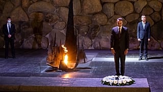 Greek Prime Minister Kyriakos Mitsotakis stands during a ceremony in the Hall of Remembrance at the Yad Vashem Holocaust Museum in Jerusalem