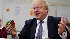 Britain's Prime Minister Boris Johnson visits the West Monkton CEVC Primary School on a General Election campaign trail in Taunton, England, Thursday, Nov. 14, 2019