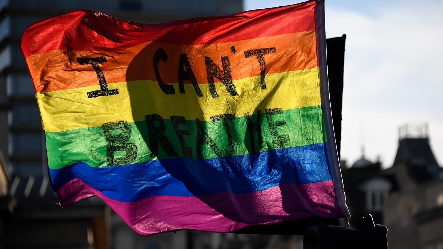 People participate in a rally at Trafalgar Square in central London, Saturday, June 20, 2020, organised by the Black Lives Matter movement