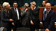 ECB President Christine Lagarde (L) with euro zone finance ministers during a January 2020 Eurogroup meeting. 