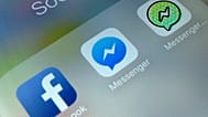 FILE - This photo shows application icons from left, Facebook, Facebook Messenger and Messenger Kids on an iPhone in New York. 16 February 2018.