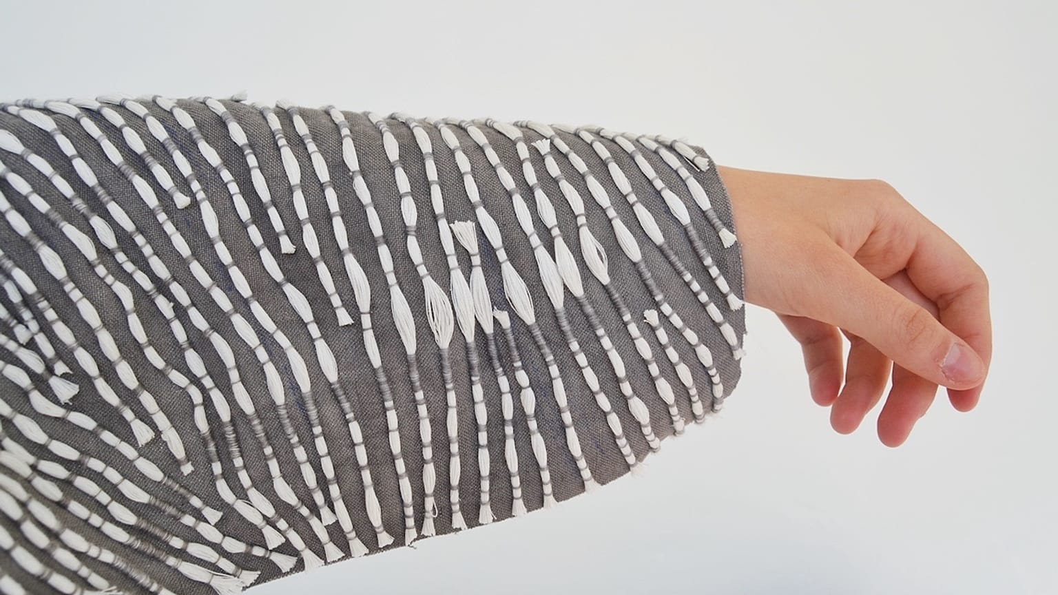 Designer makes eco-friendly burial clothes.
