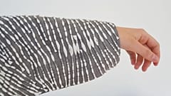 Designer makes eco-friendly burial clothes.