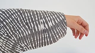 Designer makes eco-friendly burial clothes.