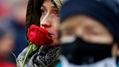 A woman takes parts in a rally on International Women's Day in Warsaw, Poland, Sunday, March 8, 2020
