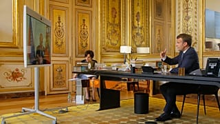 French President Emmanuel Macron talks to Russian President Vladimir Putin during a video conference Friday, June 26, 2020