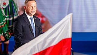 President Andrzej Duda addressees supporters shortly after voting ended in the presidential election in Lowicz, Poland, Sunday, June 28, 2020