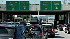 Cars waiting on the border to enter in Greece.