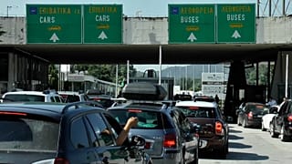 Cars waiting on the border to enter in Greece.