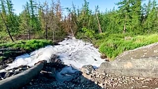 According to Novaya Gazeta, this 28 June 2020 picture shows water from a Nornickel enrichment plant gushing out of a pipe and into a river running into a nearby lake