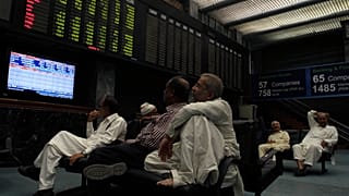 FILE: Pakistani stock brokers monitor the market at Karachi Stock Exchange in Karachi, Pakistan, Wednesday, Nov. 9, 2016.