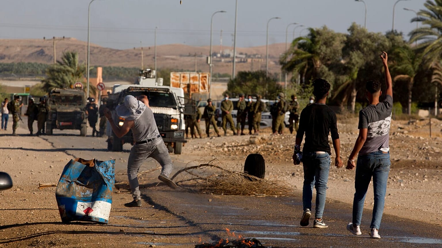 Palestinian demonstrators clash with the Israeli troops during a protest against Israel's plan to annex parts of the West Bank in Fasayil, in the Jordan Valley, Jun. 24, 2020.